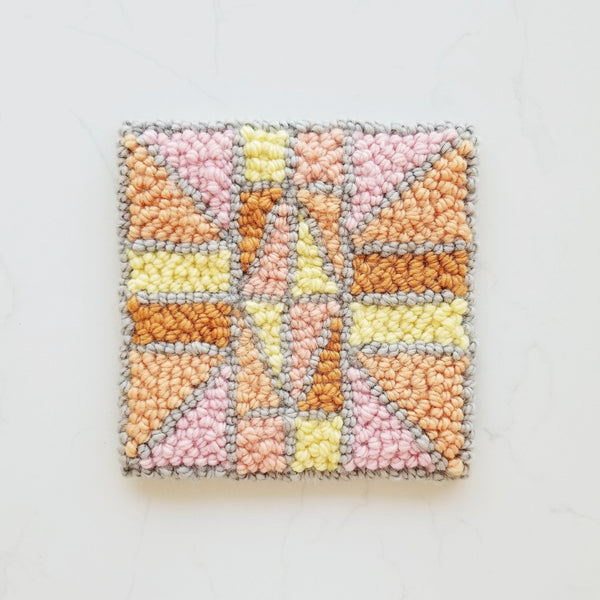 punch needle design in wool yarn geometric pattern